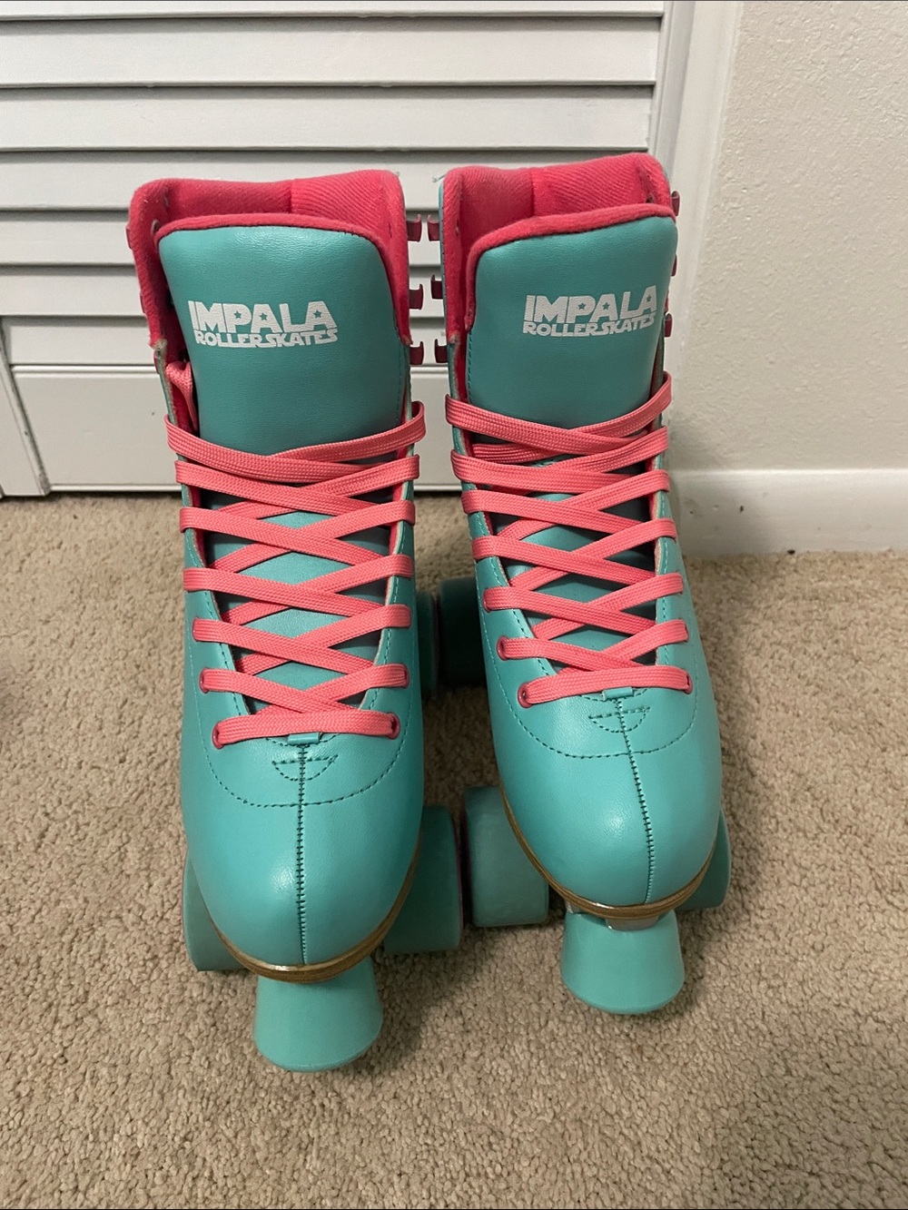 Impala Women's Teal Roller Skates with Pink Accents